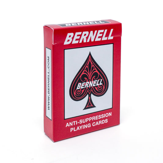 Red deck of Bernell playing cards with a black spade symbol on a white background