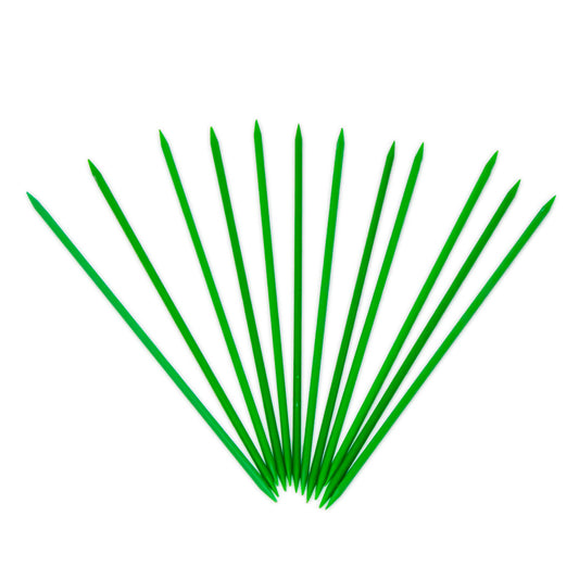 Plastic pointers spread across a white background