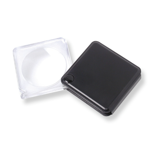 Black square flip-open pocket magnifying glass with clear lens on a white background