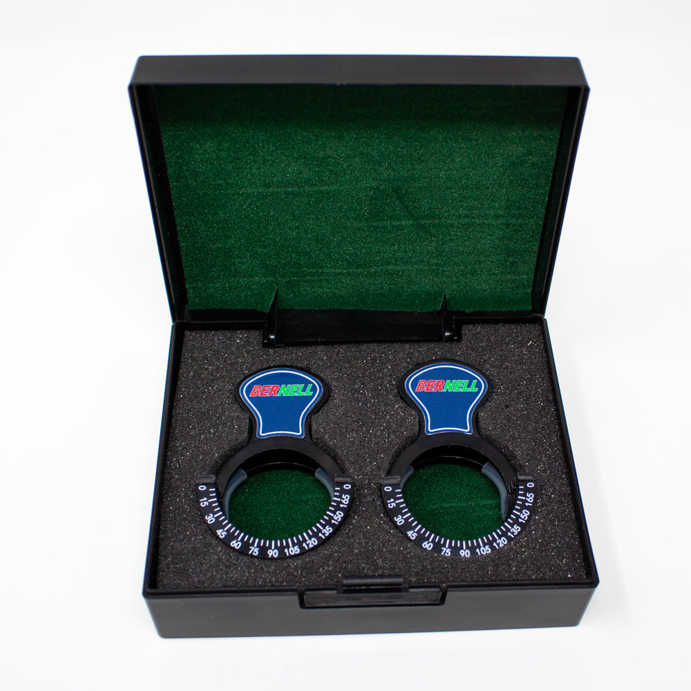 A pair of Bernell Trial Lens Clips in protective casing