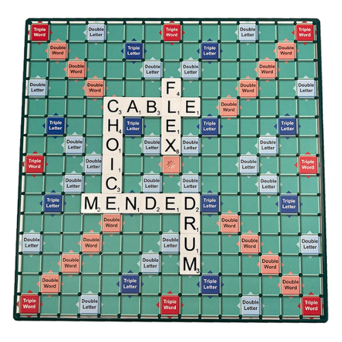 A square Scrabble-style word game board with a teal grid, black play mat, and many letter tiles in white, red, orange, and blue. The board is arranged to spell FLEX , CABLE, CHOICE, MENDED  and DRUM across the center.