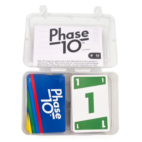 Phase 10 card game in a clear plastic storage case, showing the game board insert, a blue Phase 10 card stack, and a green card with a large number 1 with Braille imprints on a white background.