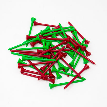 A pile of plastic golf tees in alternating bright red and green colors, arranged on a plain white background.