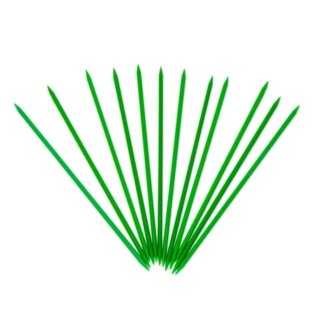 Plastic pointers spread across a white background